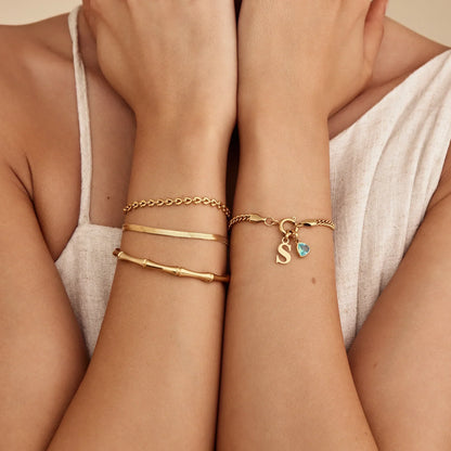 Bamboo cuff bracelet flat lay — Olivia Jewelry
