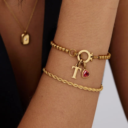 Personalised birthstone initial bracelet close-up — Olivia Jewelry
