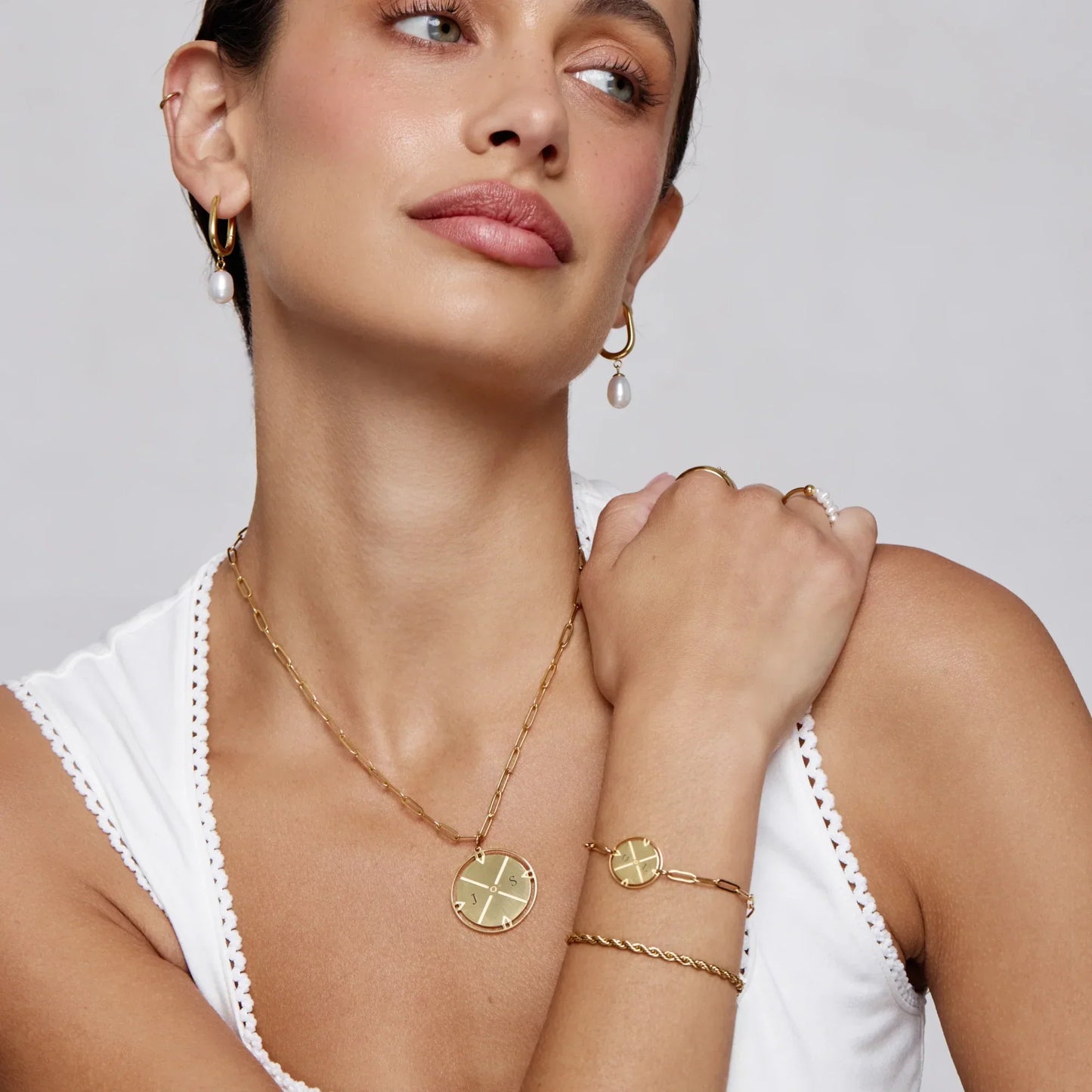 Initial compass necklace lifestyle shot — Olivia Jewelry