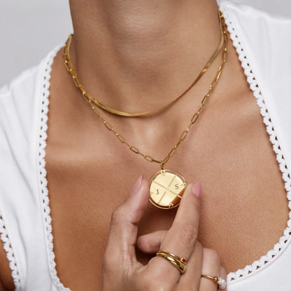 Initial compass necklace flat lay gold — Olivia Jewelry