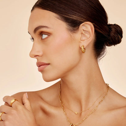 Gold twist earrings close-up detail — Olivia Jewelry