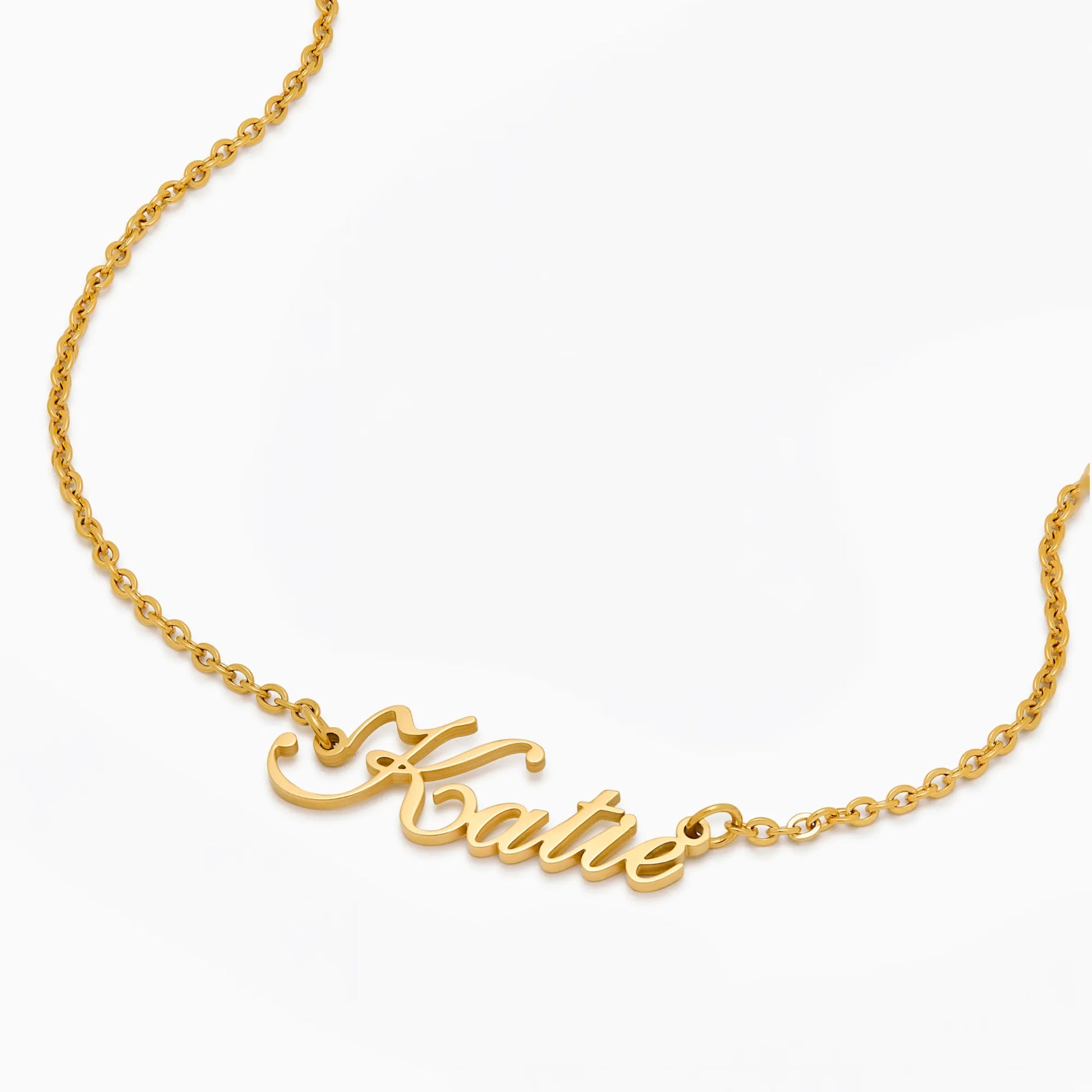 Gold signature name necklace worn on model — Olivia Jewelry