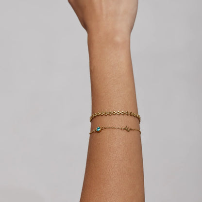 Side-set birthstone bracelet flat lay — Olivia Jewelry