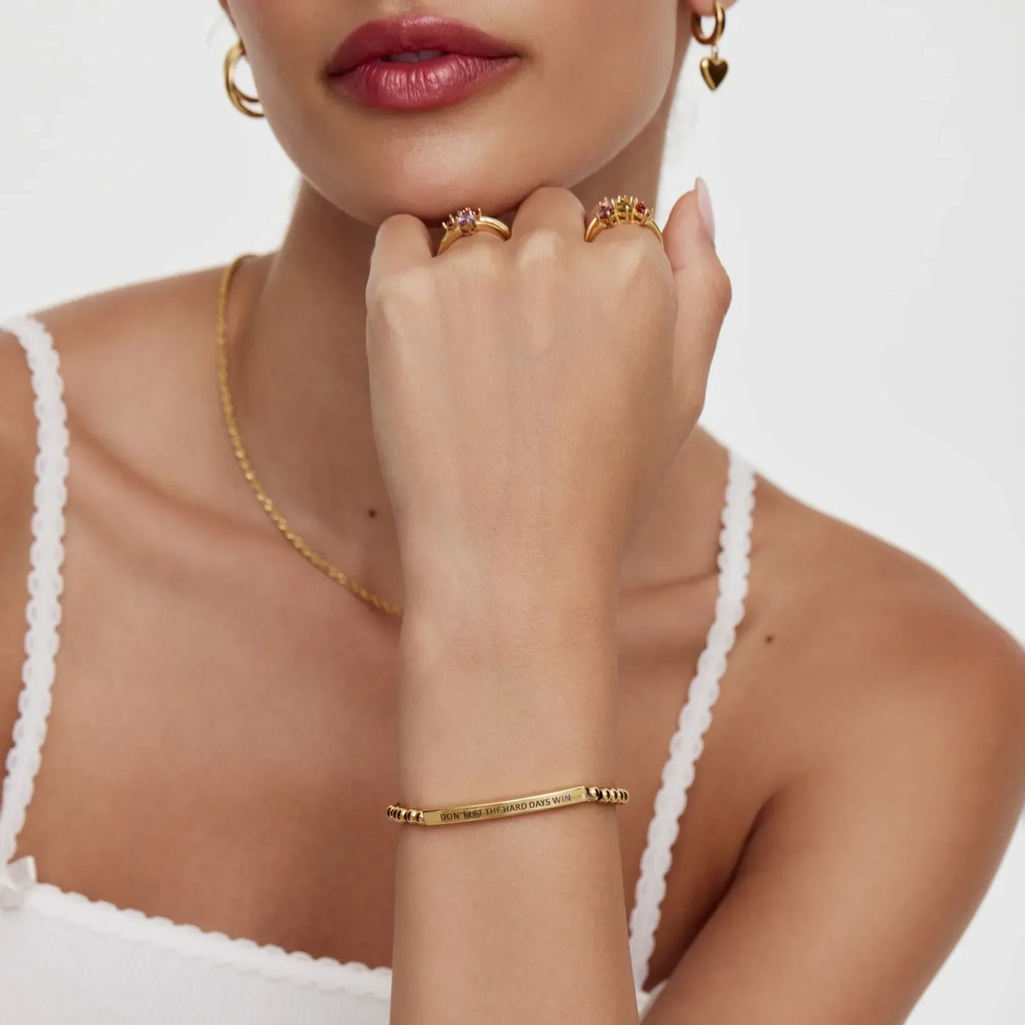 Hard Days Win bracelet flat lay gold — Olivia Jewelry