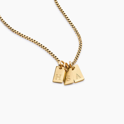 Tag initial necklace silver worn on model — Olivia Jewelry