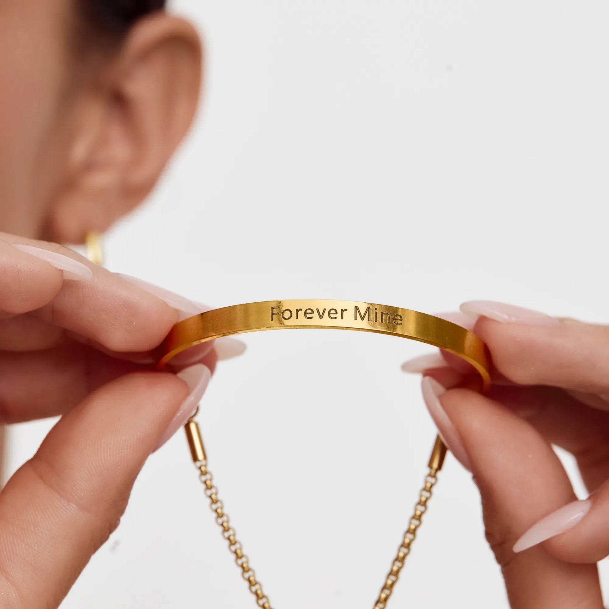 Signature bar slider bracelet flat lay — Olivia Jewelry