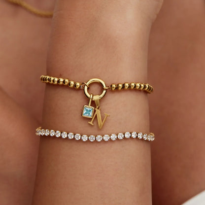 Personalised initial and birthstone beaded bracelet close-up — Olivia Jewelry