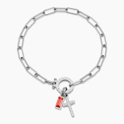 Silver paperclip cross charm bracelet on wrist — Olivia Jewelry