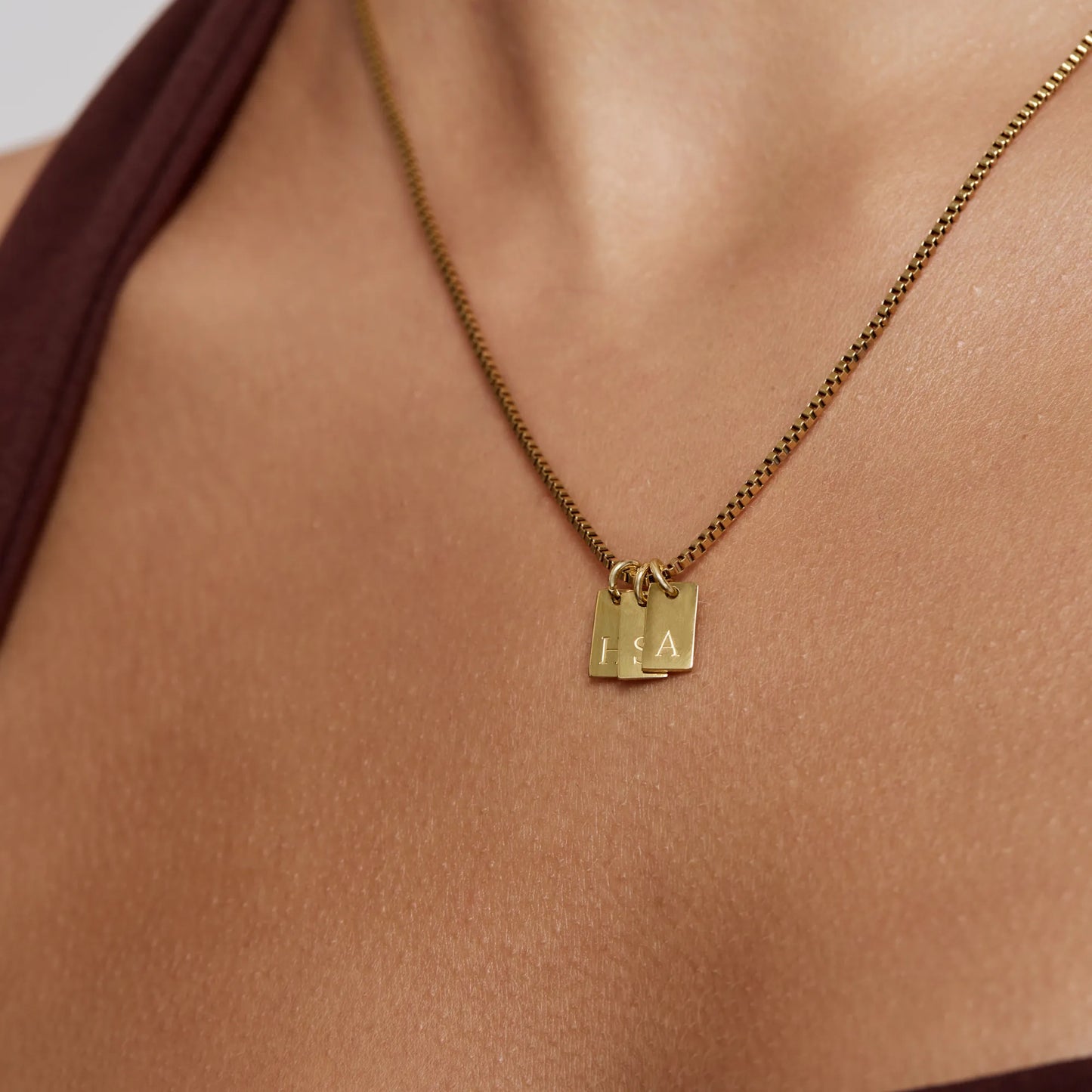 Personalised two initial tag necklace flat lay — Olivia Jewelry