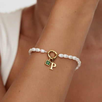 Personalised pearl initial bracelet close-up — Olivia Jewelry