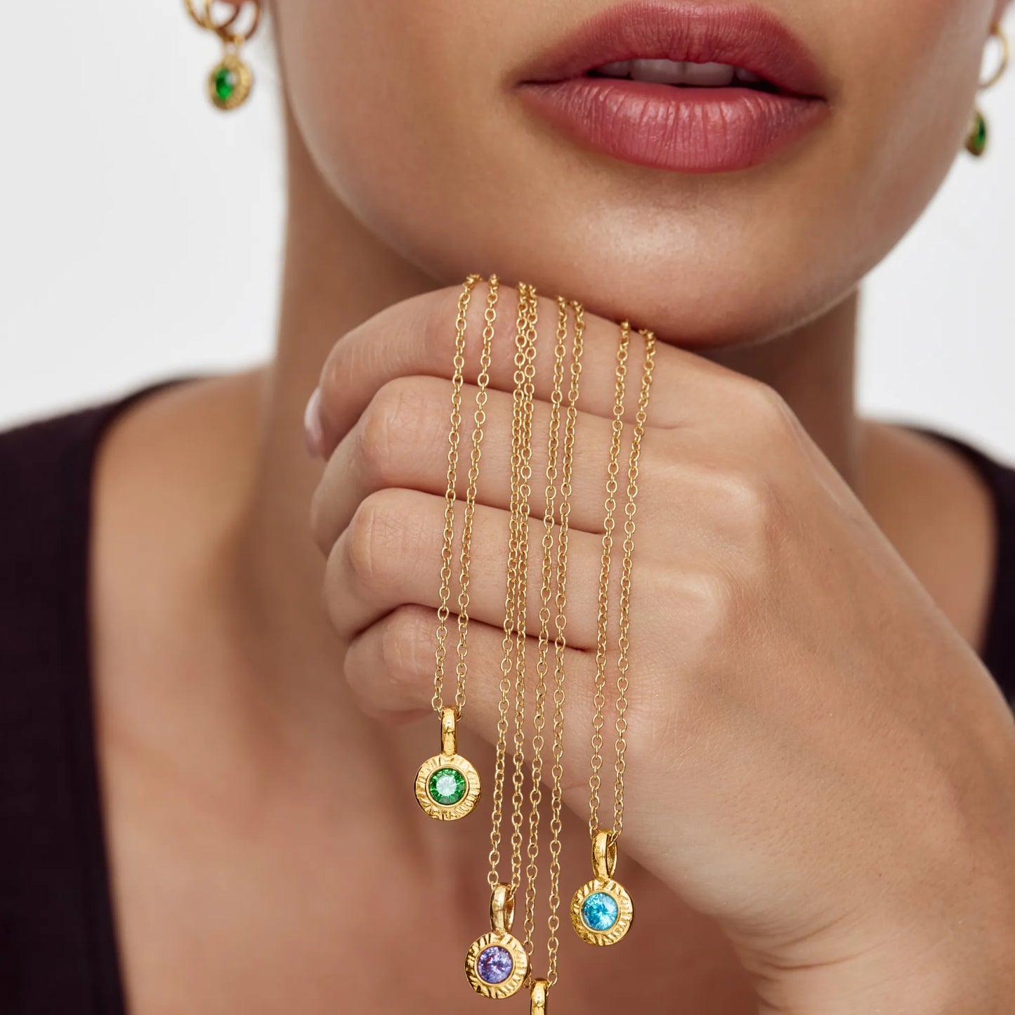 Crushed birthstone necklace flat lay — Olivia Jewelry