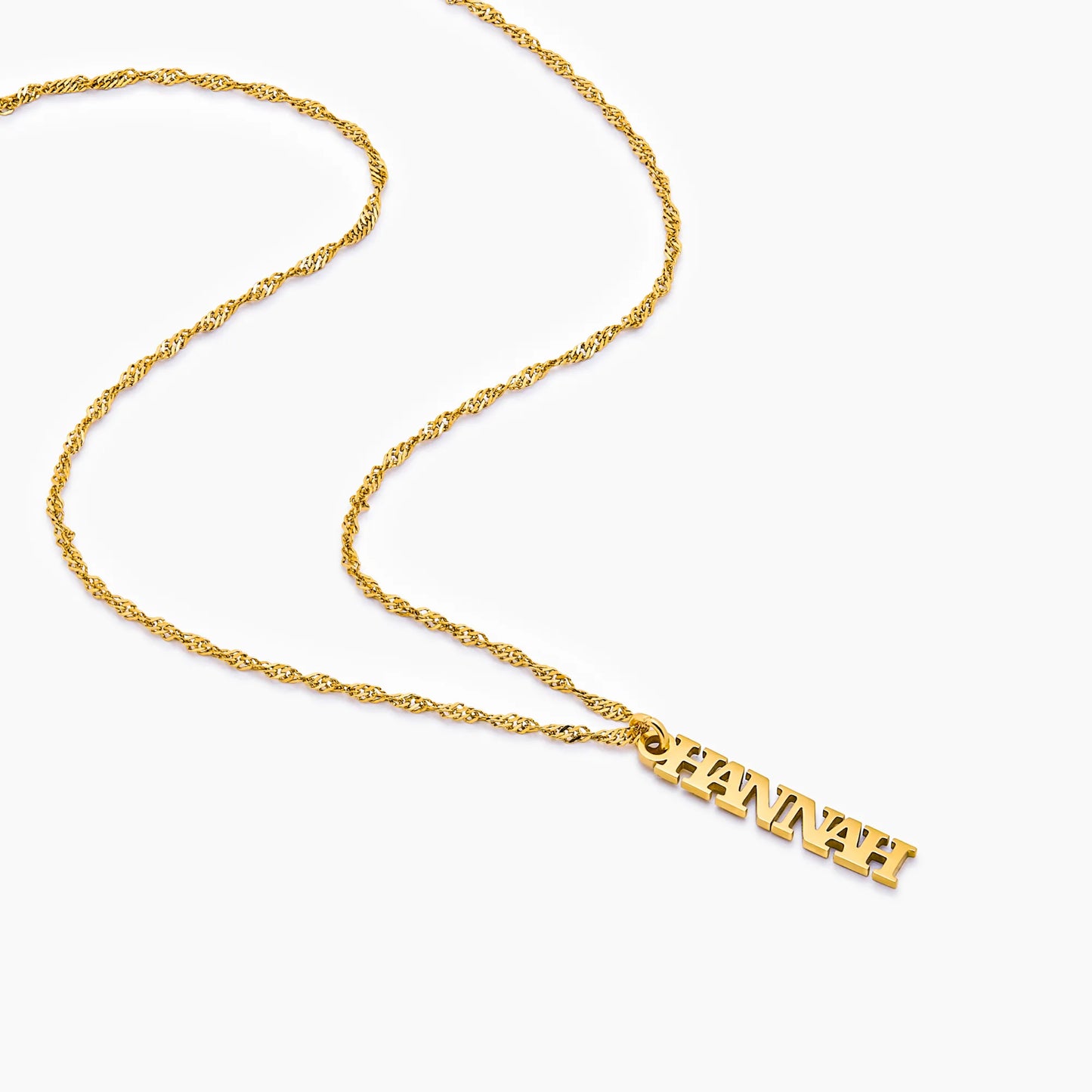 Singapore chain name necklace flat lay — Olivia Jewelry