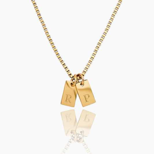 Tag initial necklace single gold tag worn on neck — Olivia Jewelry