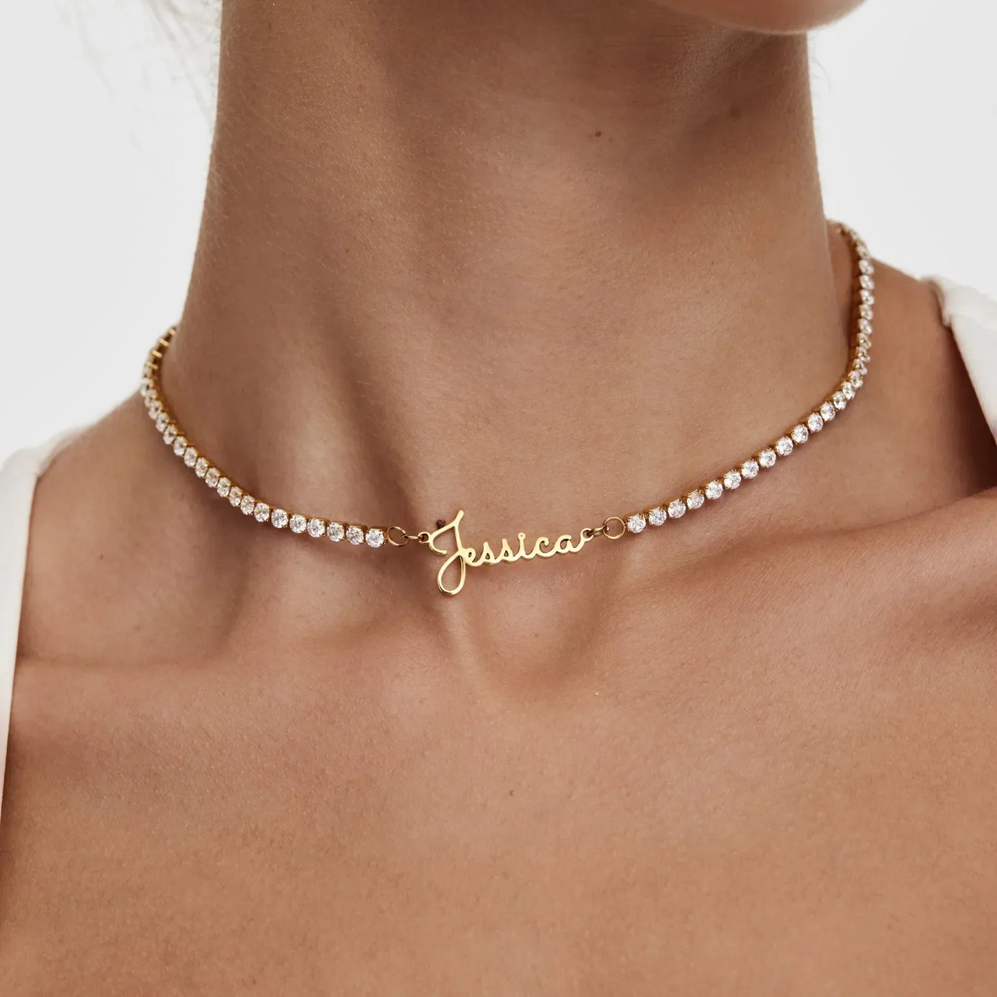Custom name necklace in gold worn on model — Olivia Jewelry