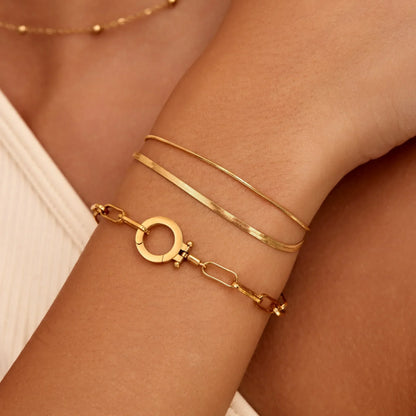 Gold paperclip chain bracelet close-up — Olivia Jewelry