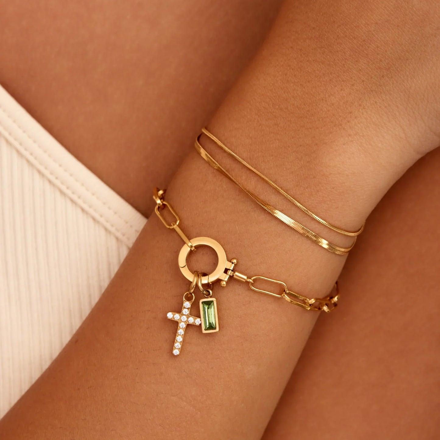 Paperclip birthstone bracelet flat lay — Olivia Jewelry