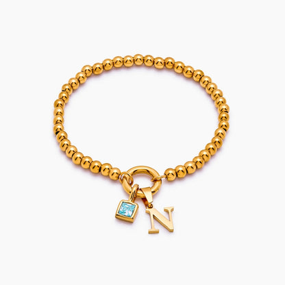 beaded-initial-birthstone-bracelet — Gold / Mar-Aquamarine