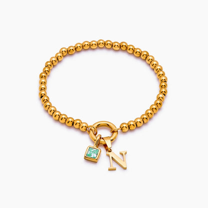 beaded-initial-birthstone-bracelet — Gold / May-Emerald
