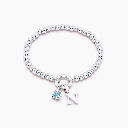 beaded-initial-birthstone-bracelet — Silver / Dec-Blue Topaz