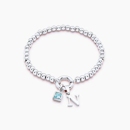 beaded-initial-birthstone-bracelet — Silver / Mar-Aquamarine