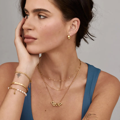 Custom bubble name necklace styled — Olivia Jewelry