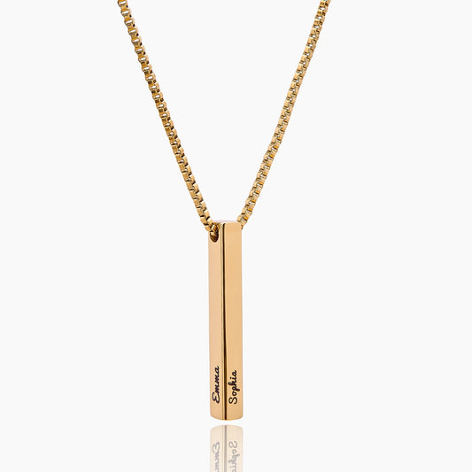Gold necklace with a vertical bar pendant on a white background